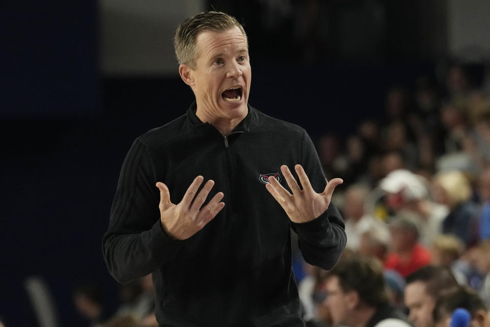 Florida Atlantic head coach Dusty May gestures during the first half of an NCAA college basketball game against Bryant University, Saturday, Nov. 18, 2023, in Boca Raton, Fla. (AP Photo/Marta Lavandier)