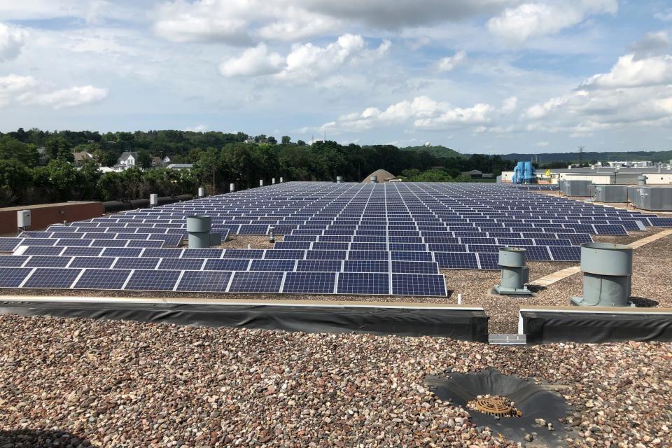 This solar array of 836 panels on the city of Dubuque, Iowa's Municipal Services Center was the subject of a lawsuit that opened the door in Iowa for private companies to partner with governments and other entities to provide solar energy. In 2018, We Energies halted a third-party-owned installation for the city of Milwaukee, arguing that the solar developer would be acting as a public utility. Dubuque-based Eagle Point Solar was involved in both projects.