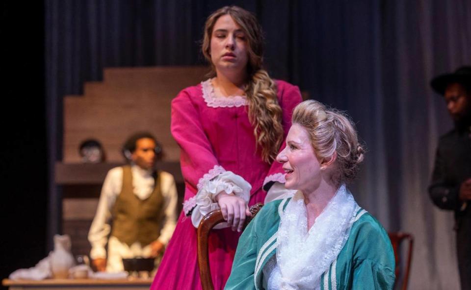 North Carolina First Lady Kristin Cooper portrays Martha Washington, in a scene with Isabelle Rose Moore, who portrays Betsey Parker Custis, during a dress rehearsal of “Ona” by Keith Burridge, on Wednesday, September 13, 2023 in Raleigh, N.C.