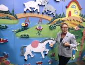 Parti Quebecois leader Pauline Marois tours a children's indoor play centre in Blainville, Quebec March 25, 2014. The governing separatist Parti Quebecois would lose next month's Quebec provincial election if it were held now, a poll released on Tuesday showed, a casualty of renewed concentration during the campaign on the issue of independence from Canada. REUTERS/Christinne Muschi (CANADA - Tags: POLITICS)