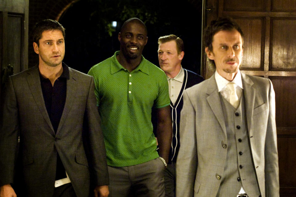 ROCKNROLLA, from left: Gerard Butler, Idris Elba, Matthew King, Geoff Bell, 2008. ©Warner Bros./courtesy Everett Collection