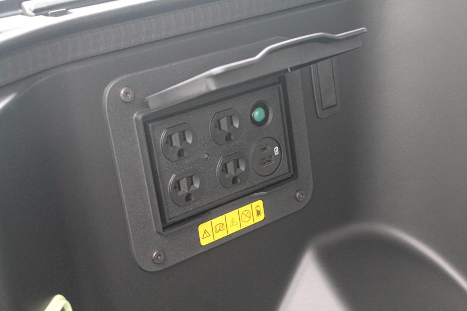 A cluster of outlets in the F-150 Lightning Platinum's front trunk.