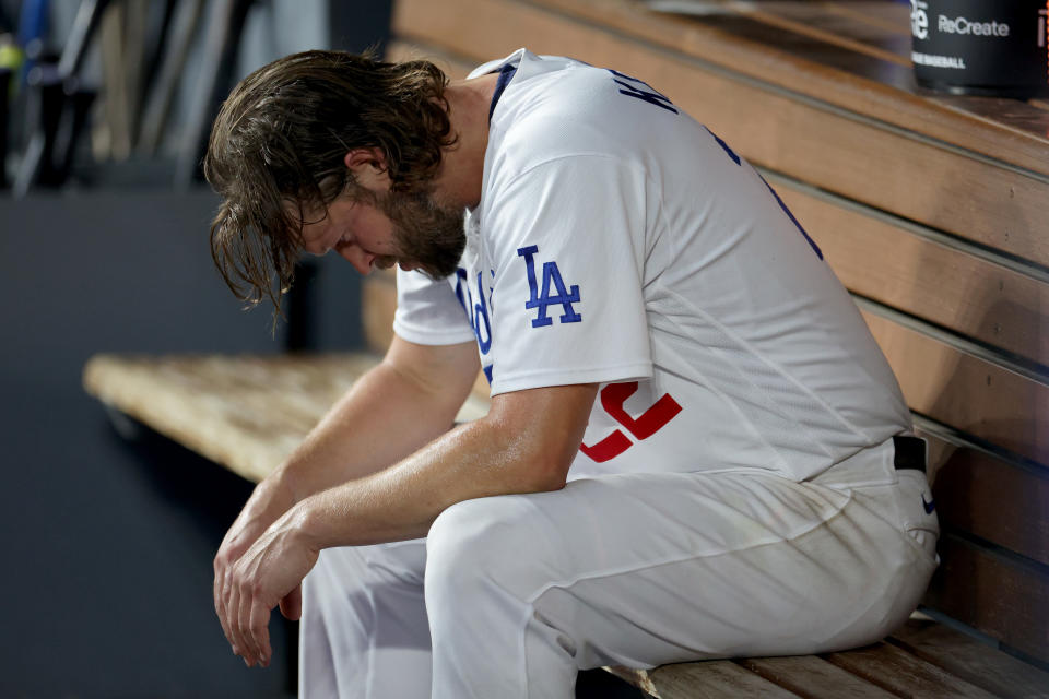 LOS ANGELES, CALIFORNIA - OCTOBER 07: Clayton Kershaw #22 of the Los Angeles Dodgers sits in the dugout after being relieved in the first inning against the Arizona Diamondbacks during Game One of the Division Series at Dodger Stadium on October 07, 2023 in Los Angeles, California. (Photo by Harry How/Getty Images)