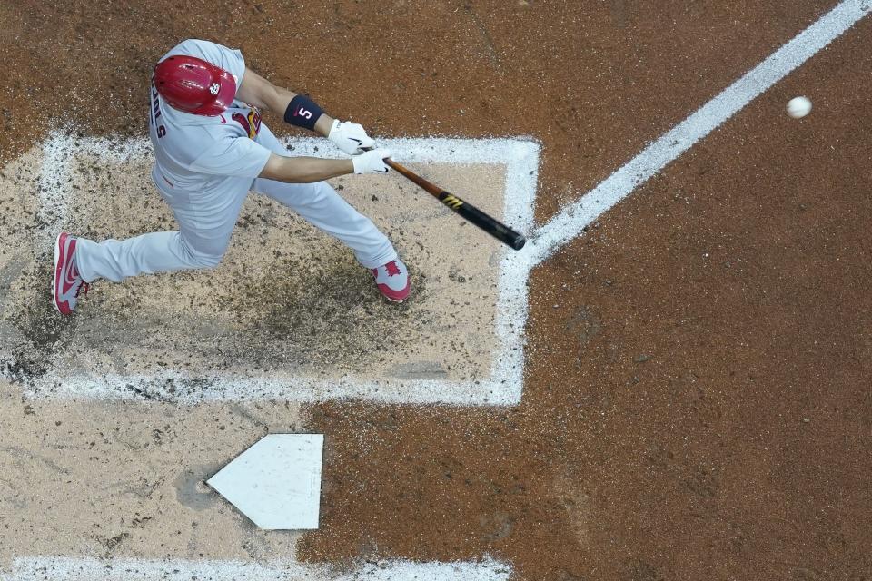 St. Louis Cardinals' Albert Pujols hits an RBI sacrifice fly during the fourth inning of a baseball game against the Milwaukee Brewers Wednesday, June 22, 2022, in Milwaukee. (AP Photo/Morry Gash)