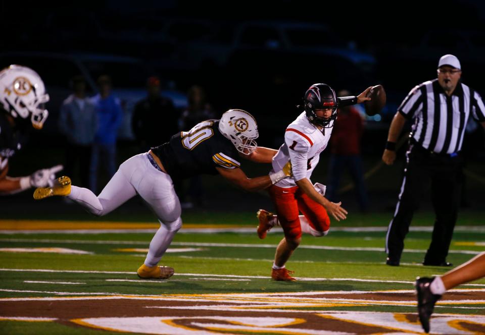 Kickapoo's Andrew Link sacks West Plains quarterback Aiden Simpson during a game at Kickapoo on Friday, Sept. 30, 2022.