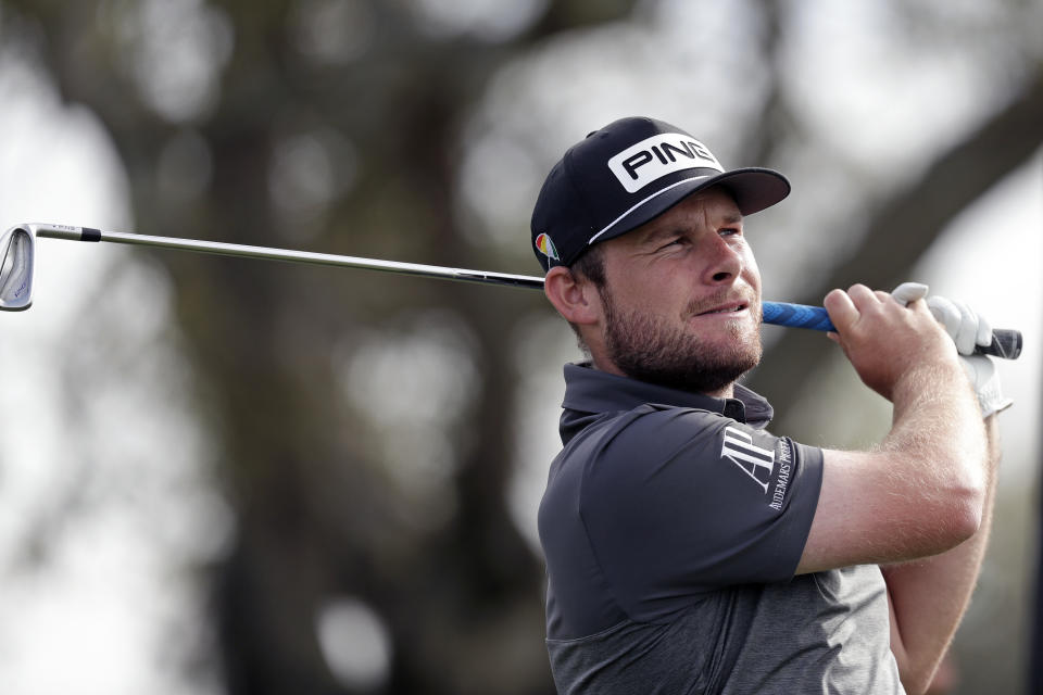 CORRECTS SPELLING TO TYRRELL, INSTEAD OF TYRELL - Tyrrell Hatton, of England, watches his shot from the seventh tee during the second round of the Arnold Palmer Invitational golf tournament Friday, March 6, 2020, in Orlando, Fla. (AP Photo/John Raoux)