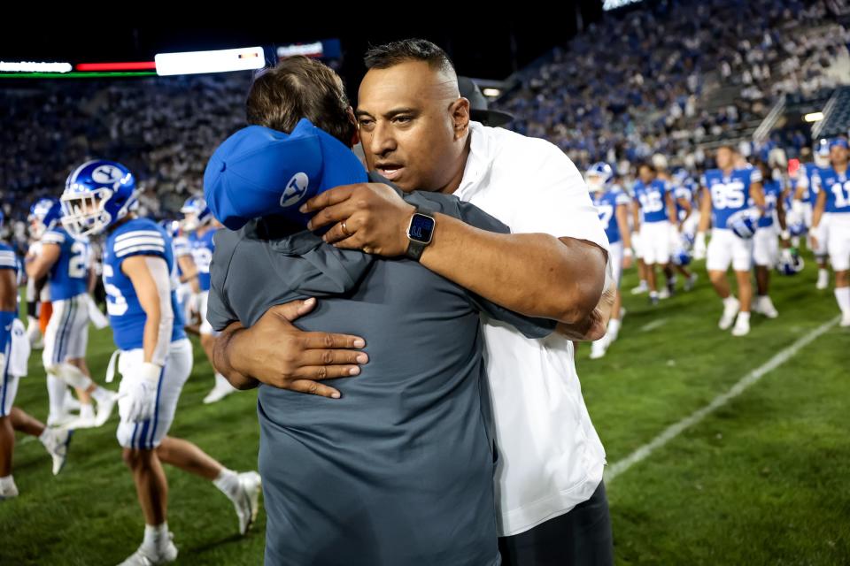 BYU Cougars head coach Kalani Sitake and Sam Houston Bearkats head coach K.C. Keeler embrace after the game at LaVell Edwards Stadium in Provo on Saturday, Sept. 2, 2023. | Spenser Heaps, Deseret News