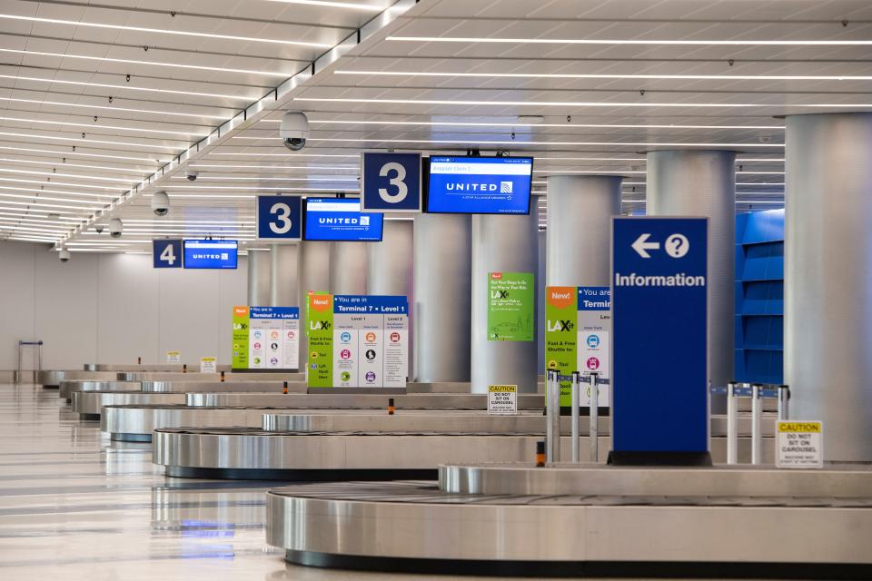 A view of baggage claim at the United Airlines terminal at Los Angeles International Airport (LAX) during the outbreak of the novel coronavirus, which causes COVID-19, April 16, 2020, in Los Angeles. (Photo by VALERIE MACON / AFP) (Photo by VALERIE MACON/AFP via Getty Images)