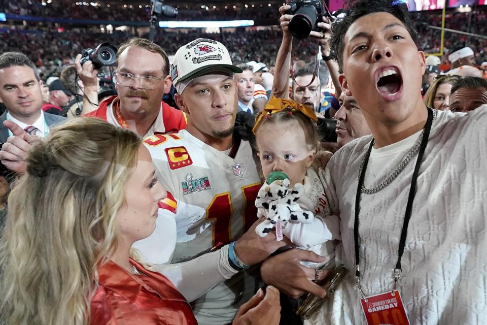 Kansas City Chiefs quarterback Patrick Mahomes, middle, and his wife Brittany, left, celebrate with their daughter, Sterling Skye Mahomes, and Jackson Mahomes after the NFL Super Bowl 57 football game, in Glendale, Ariz. The Kansas City Chiefs defeated the Philadelphia Eagles 38-35 Super Bowl Football, Glendale, United States - 12 Feb 2023