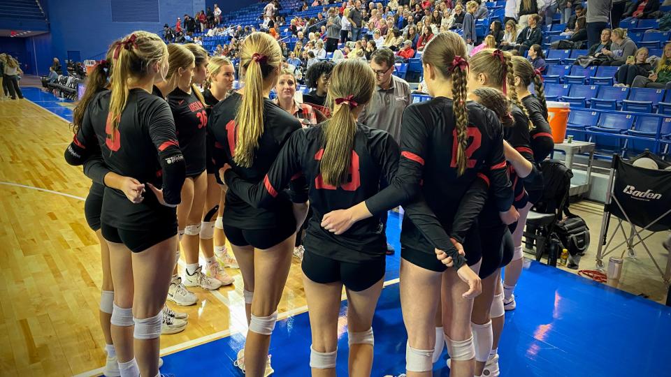 Ursuline Academy huddles during a semifinal matchup against Tower Hill. Ursuline won to advance to the volleyball state title game.