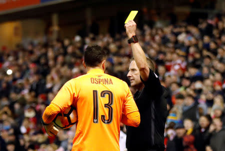 Soccer Football - FA Cup Third Round - Nottingham Forest vs Arsenal - The City Ground, Nottingham, Britain - January 7, 2018 Arsenal's David Ospina is shown a yellow card by referee Jon Moss Action Images via Reuters/Carl Recine