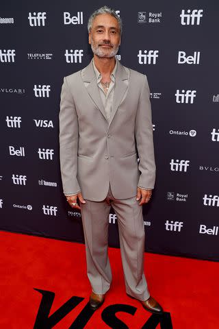 <p>Leon Bennett/Getty</p> Taika Waititi attends the <em>Next Goal Wins</em> premiere during the Toronto International Film Festival on Sept. 10, 2023, in Toronto, Ontario
