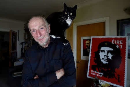 Artist Jim Fitzpatrick who has created an Irish postage stamp using the poster of Che Guevara he created in 1968 entitled 'Viva Che!' based on a photograph by Alberto Korda poses for a picture at his studio in Dublin, Ireland October 11, 2017. REUTERS/Clodagh Kilcoyne
