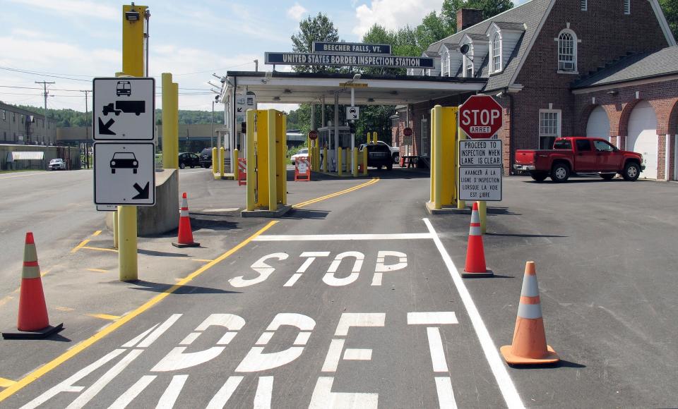 This Aug. 2, 2017 photo shows the U.S. border crossing post at the Canadian border between Vermont and Quebec, Canada, at Beecher Falls, Vt.