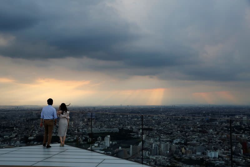 The Wider Image: Postcards from Tokyo: light and shadow ahead of pandemic Olympics