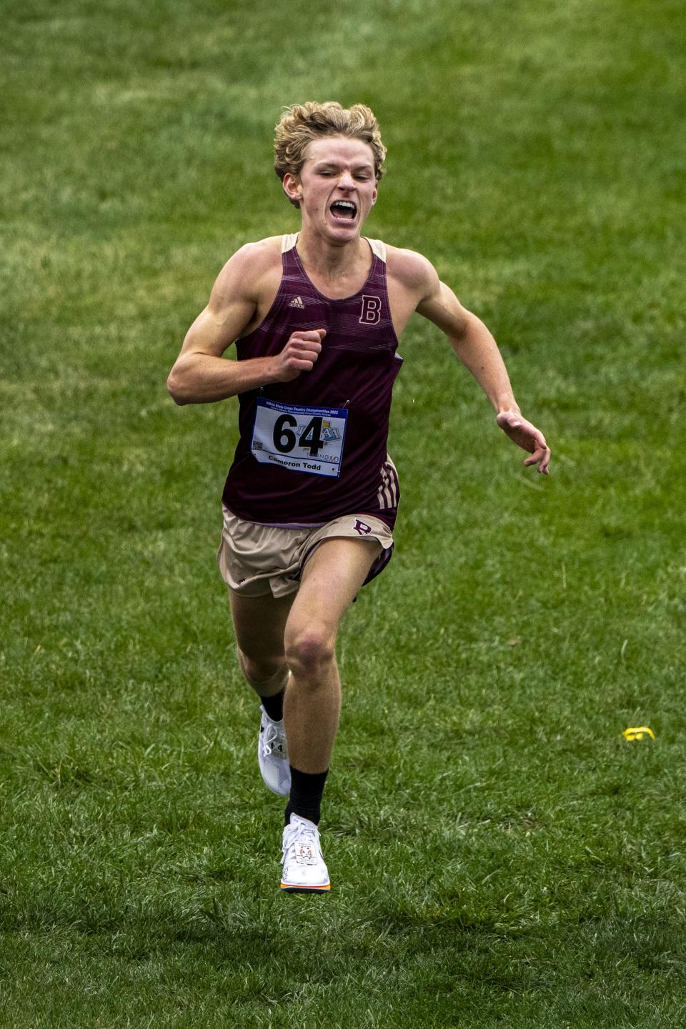 Brebeuf Jesuit High School senior Cameron Todd crosses the finish line to win the 78th annual IHSAA Boys Cross Country State Championship, Saturday, Oct. 28, 2023, at LaVern Gibson Championship Cross County Course.