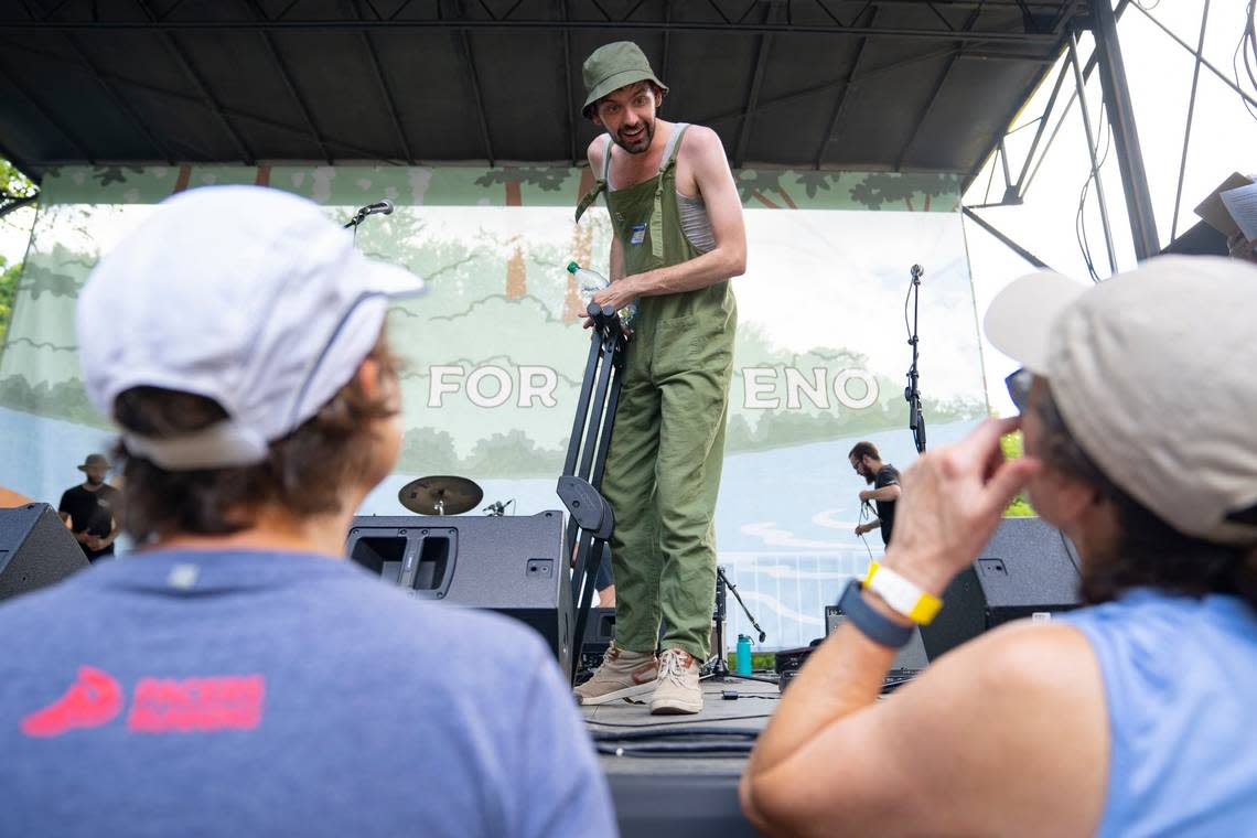 Jones Bell, lead vocalist for the Mellow Swells, talks to fans after the band’s set at the Festival for the Eno in Durham, N.C. on Saturday, July 2, 2022.