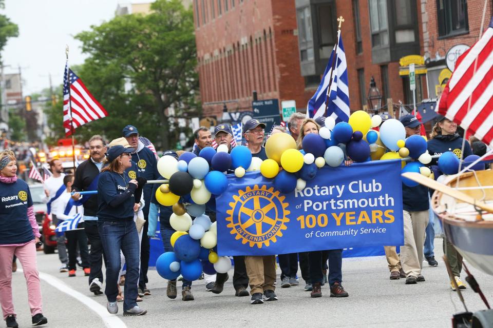 The Rotary Club of Portsmouth, celebrating over 100 years, takes part in the city's 400th anniversary parade Saturday, June 3, 2023.