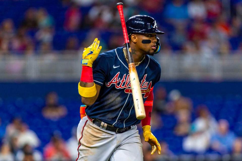 Atlanta Braves batter Ronald Acuna Jr. (13) flips his bat after hitting a home run during the fifth inning of a MLB game against the Miami Marlins at loanDepot Park, in Miami, Florida, on Wednesday, May 3, 2023.