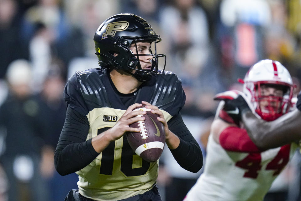 Purdue quarterback Aidan O'Connell (16) throws against Nebraska during the first half of an NCAA college football game in West Lafayette, Ind., Saturday, Oct. 15, 2022. (AP Photo/Michael Conroy)