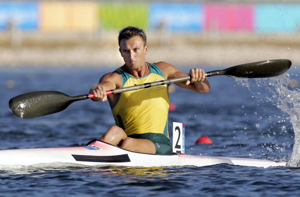 Nathan Baggaley of Australia paddles to the second place in the Men's K1 500 meter final to take the silver medal, during the kayak flatwater event at the 2004 Olympic Games in Schinias near Athens, Greece, Saturday, Aug. 28, 2004. (AP Photo/Mark J. Terrill)