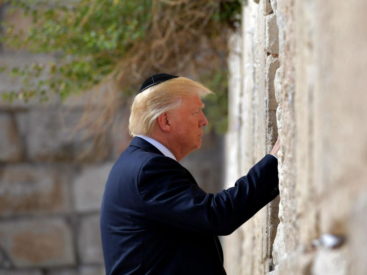 Donald Trump visits the Western Wall, the holiest site where Jews can pray, in Jerusalem's Old City on May 22, 2017: Getty