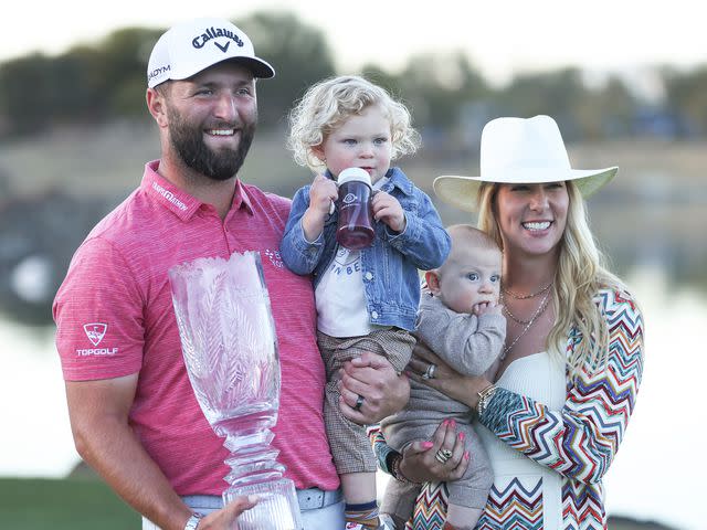 Katelyn Mulcahy/Getty Jon Rahm with wife Kelley (R), sons Kepa Cahill Rahm (2nd L) and Eneko Cahill Rahm (2nd R) after winning during the final round of The American Express at PGA West Pete Dye Stadium Course on January 22, 2023 in La Quinta, California.