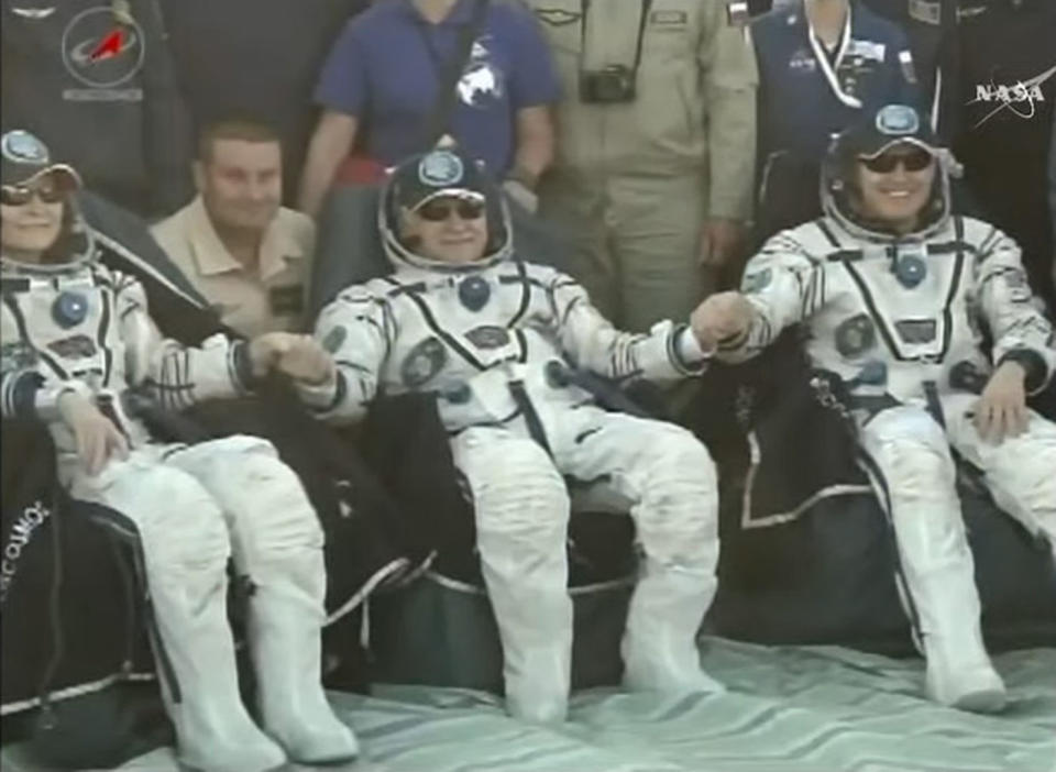 NASA astronaut Peggy Whitson (left), Russian cosmonaut Fyodor Yurchikhin (center) and NASA astronaut Jack Fischer (right) pose for a photo after landing in Kazakhstan on Sept. 3, 2017 local time (late Sept. 2, EDT). Whitson spent 288 days on the space station during her flight, with Fischer and Yurchikhin spending 136 days on their mission. <cite>NASA TV</cite>