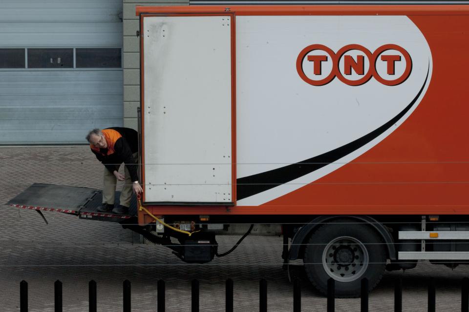 FILE - In a Feb. 21, 2012 file photo a TNT delivery truck is seen in Hoofddorp, near Amsterdam, Netherlands. United Parcel Service Inc. said Monday March 19, 2012, it has agreed to buy TNT Express NV for $6.77 billion (€5.16 billion). (AP Photo/Peter Dejong/file)