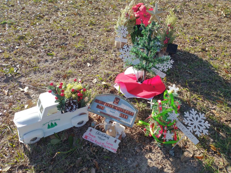 Christmas trees and trinkets adorn the gravesites of Maggie and Paul Murdaugh, murdered two Christmases ago in June of 2021.