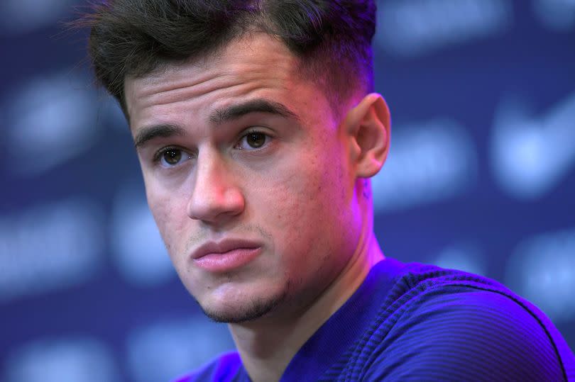 Philippe Coutinho looks on during a press conference in Barcelona