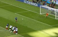 <p>Antoine Griezmann of scores a penalty to give France the lead against Argentina after nine minutes. </p>