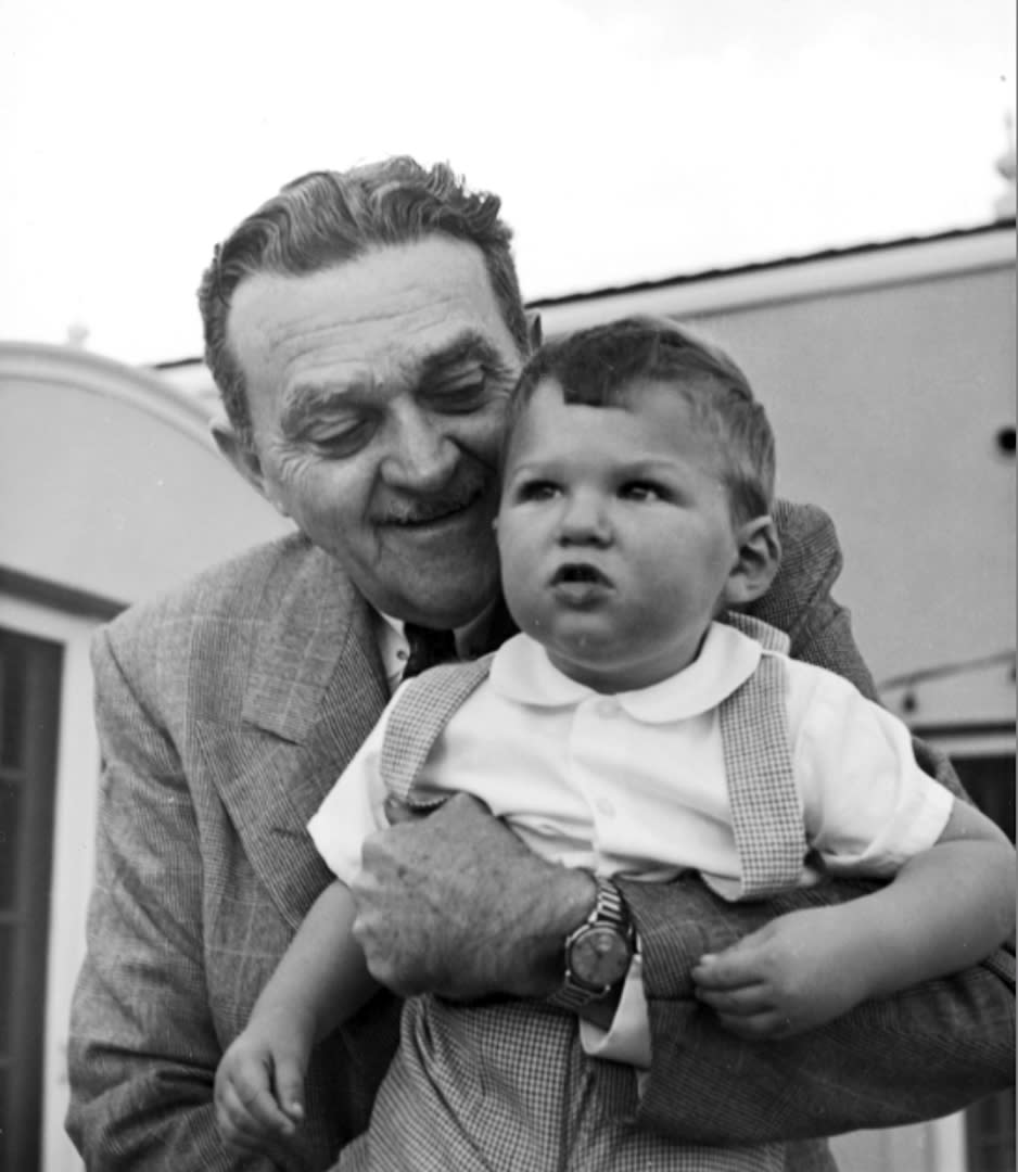 This 1952 photo shows Billy Wilkerson with his son, Willie. The son of Hollywood Reporter founder Billy Wilkerson, W.R. Wilkerson III, is apologizing for his father's and the trade paper's role in the 1947 Hollywood Blacklist that destroyed the careers of writers, actors and directors accused of having Communist ties. He offers his “sincerest apologies and deepest regrets to those who were victimized by this unfortunate incident.” (AP Photo/Wilkerson Archives, Alex Paal)