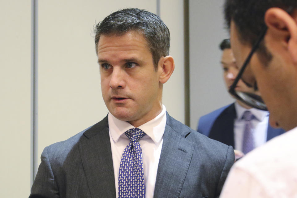 Rep. Adam Kinzinger R-Ill., speaks to reporters after attending an event Thursday, Oct. 3, 2019, in Chicago. They don't like the talk of impeachment, but there's a small and growing number of Republicans who want the Democratic-run House investigation of President Donald Trump to proceed. 'I want to know what happened," Rep. Adam Kinzinger, said Thursday. But he and some others, including moderates in tight reelection races, say Democrats went too far by starting an impeachment inquiry. (AP Photo/Noreen Nasir)