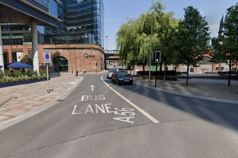 A contra-flow bus lane on Chapel Street in Salford, Greater Manchester.