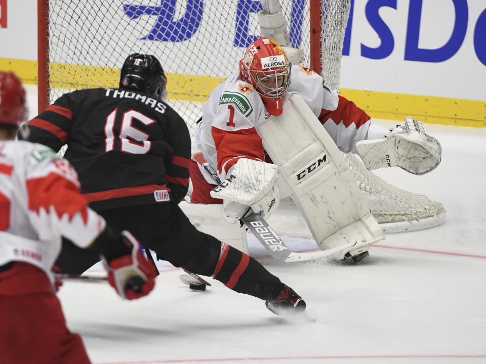 Canada's Akil Thomas scores the winning goal past Russia goaltender Amir Miftakhov during third-period action in the gold medal game at the World Junior Hockey Championships, Sunday, Jan. 5, 2020, in Ostrava, Czech Republic. (Ryan Remiorz/The Canadian Press via AP)