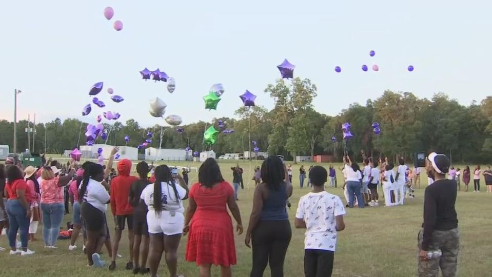 Dozens in the Ocala community honored the life of Ajike “AJ” Owens, the woman her neighbor allegedly shot and killed almost a week ago.