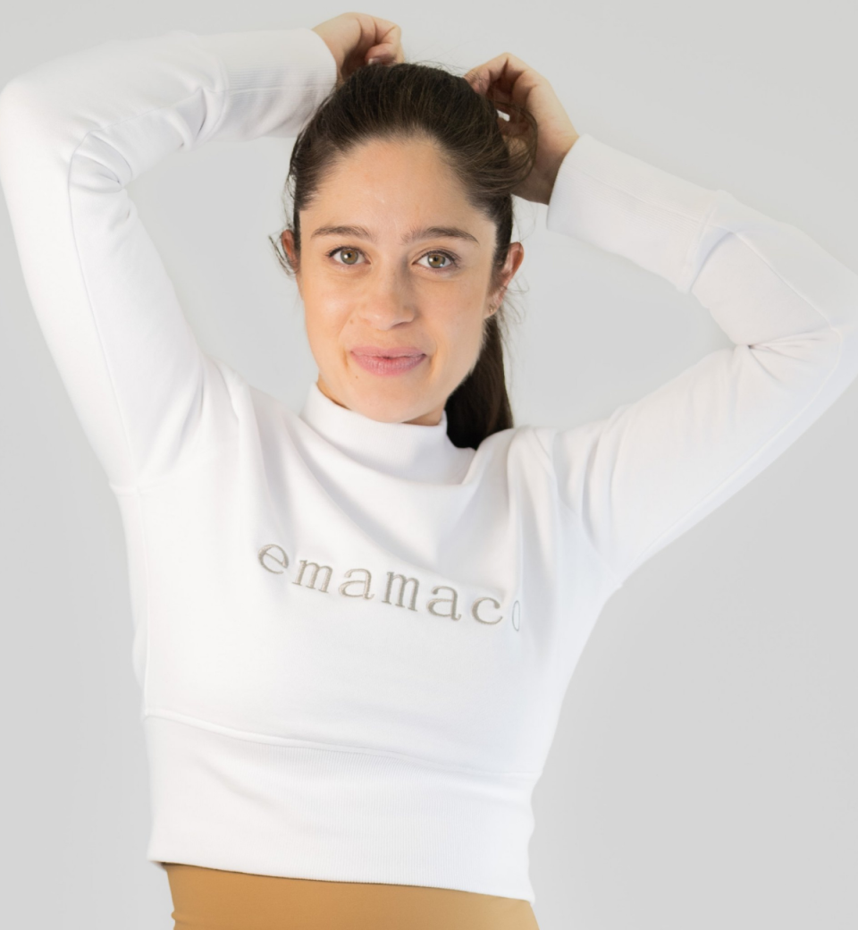 Head and shoulders shot of model wearing cropped jumper from emamaco