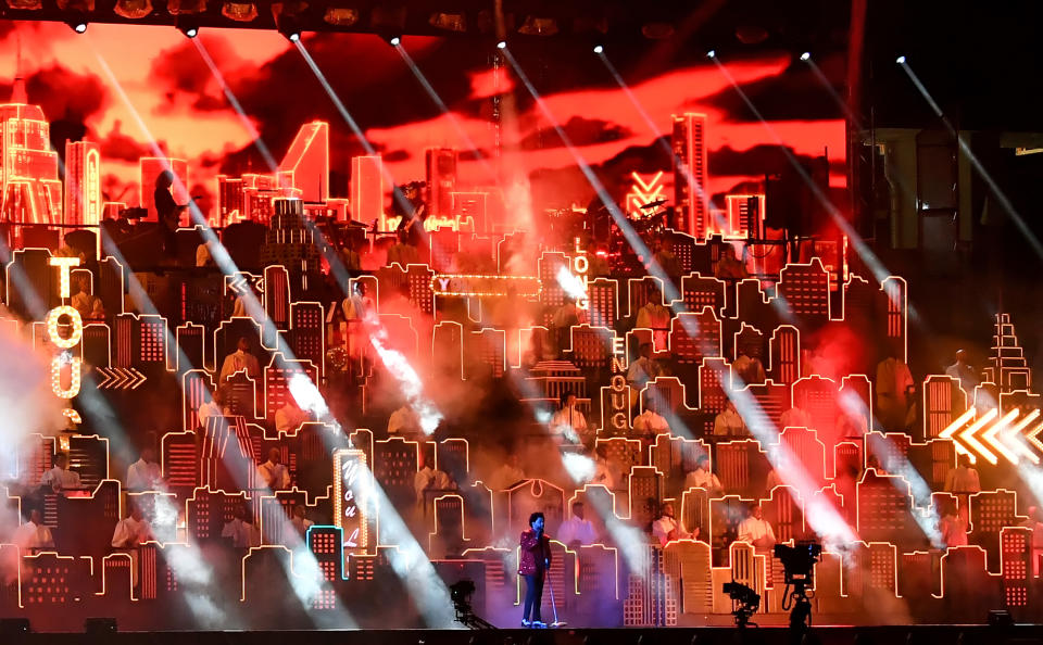 <p>TAMPA, FLORIDA - FEBRUARY 07: The Weeknd performs onstage during the Pepsi Super Bowl LV Halftime Show at Raymond James Stadium on February 07, 2021 in Tampa, Florida. (Photo by Kevin Mazur/Getty Images for TW)</p> 