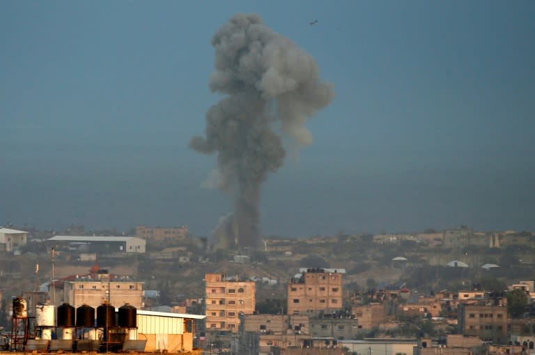 Smoke billows over the Gaza Strip town of Rafah on October 17, 2018, as the first rocket fire into Israel in weeks sparks retaliatory air strikes and fears of a new war