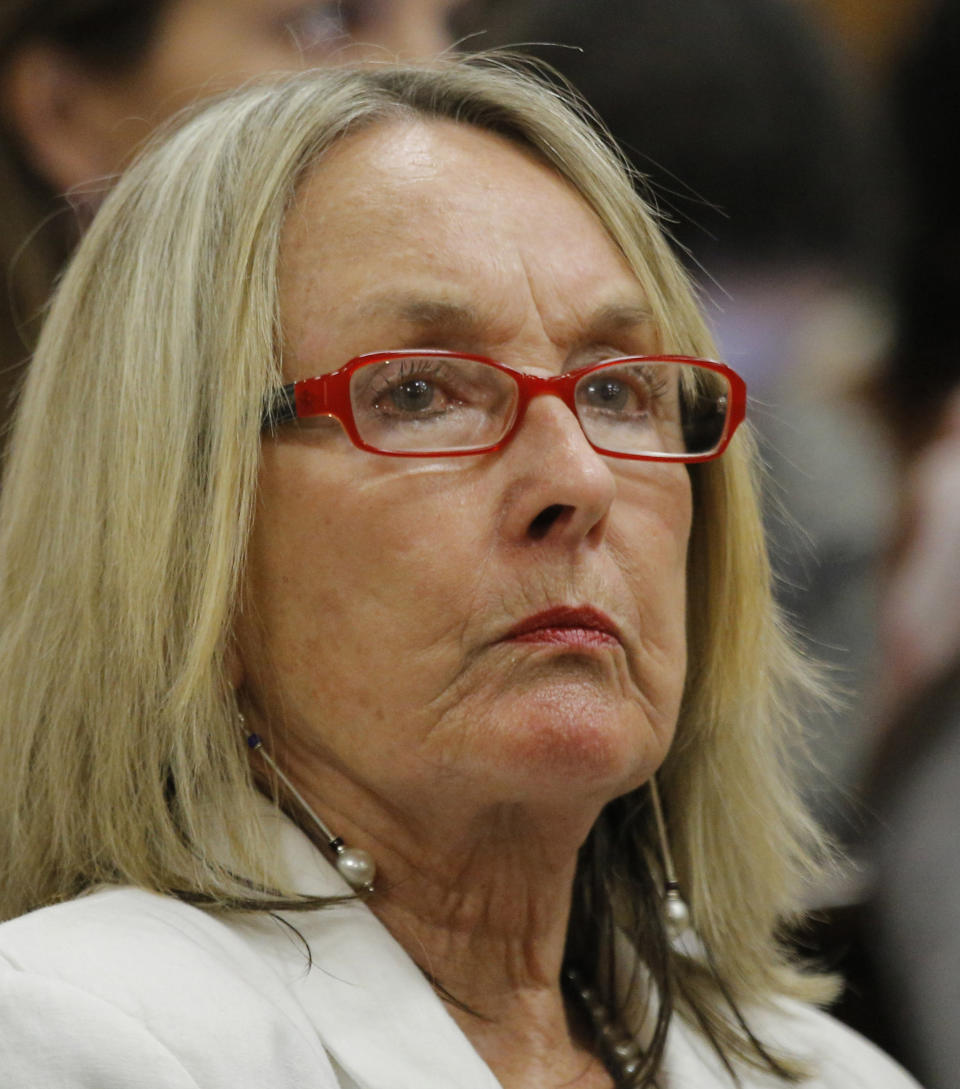 Mother of the late Reeva Steenkamp, listens to state prosecutor Gerrie Nel, question Oscar Pistorius in court in Pretoria, South Africa, Monday, April 14, 2014. Pistorius is charged with the murder of his girlfriend Steenkamp, on Valentines Day in 2013. (AP Photo/Kim Ludbrook, Pool)