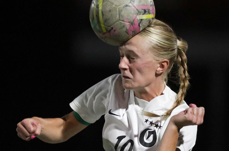 Olympus High’s Hope Munson heads the ball during a girls varsity soccer game against Skyline at Skyline High School in Millcreek on Monday, Sept. 11, 2023. Skyline won 3-1. | Kristin Murphy, Deseret News