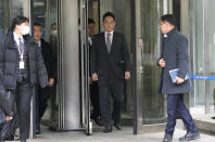 Samsung Electronics Chairman Lee Jae-yong, second from right, leaves the Seoul Central District Court in Seoul, South Korea, Monday, Feb. 5, 2024. A South Korean court acquitted Lee of financial crimes in relation to a contentious merger between two Samsung affiliates in 2015 that tightened his grip over South Korea’s biggest company. (AP Photo/Ahn Young-joon)