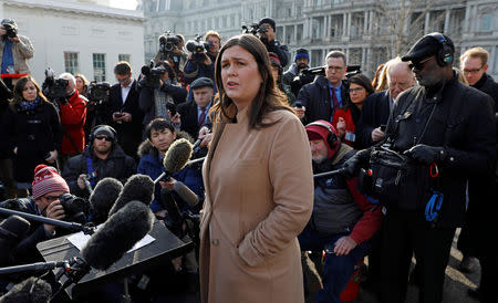 White House spokeswoman Sarah Sanders speaks to reporters at the White House in Washington, U.S., January 18, 2019. REUTERS/Kevin Lamarque