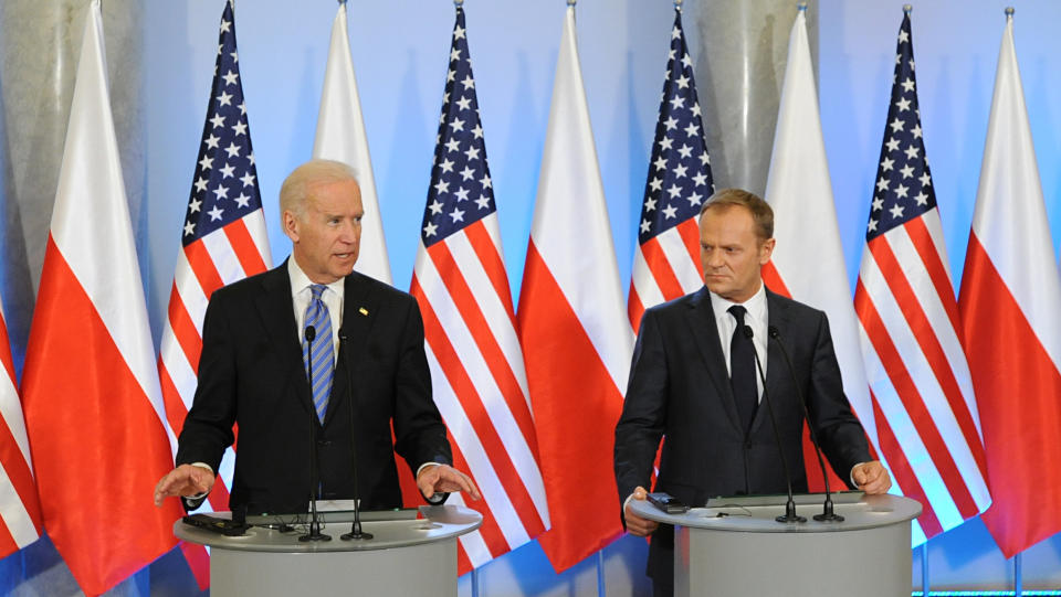 U.S. Vice President Joe Biden, left, speaks to the press after talks with Polish Prime Minister Donald Tusk, right, in Warsaw, Poland, Tuesday, March 18, 2014. Biden arrived in Warsaw for consultations with Prime Minister Donald Tusk and President Bronislaw Komorowski, a few hours after Russian President Vladimir Putin approved a draft bill for the annexation of Crimea, one of a flurry of steps to formally take over the Black Sea peninsula. (AP Photo/Alik Keplicz)