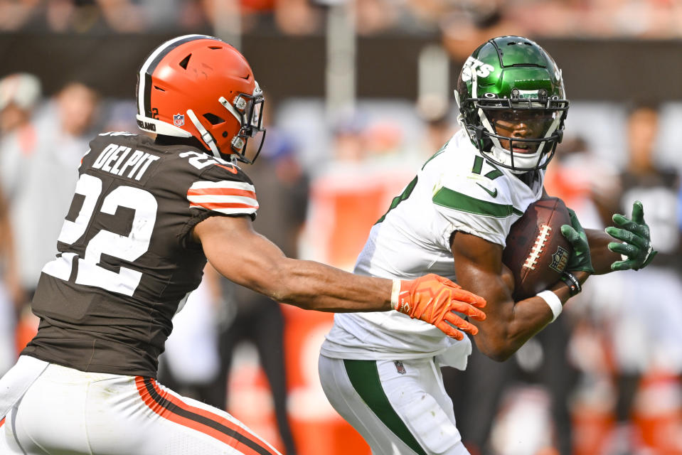 Cleveland Browns safety Grant Delpit (22) chases after New York Jets wide receiver Garrett Wilson after he made a catch and then took it in for a touchdown during the second half of an NFL football game, Sunday, Sept. 18, 2022, in Cleveland. The Jets won 31-30. (AP Photo/David Richard)