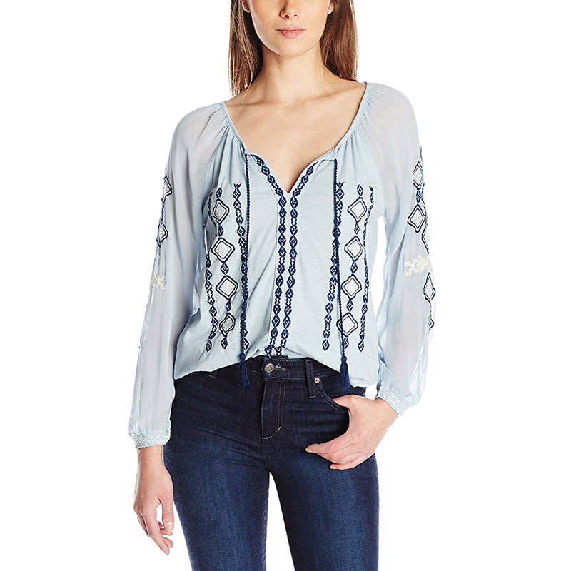 <p><a rel="nofollow noopener" href="http://amzn.to/2trwTfh" target="_blank" data-ylk="slk:Lucky Brand Embroidered Woven Mix Top;elm:context_link;itc:0;sec:content-canvas" class="link ">Lucky Brand Embroidered Woven Mix Top</a>, $70</p>