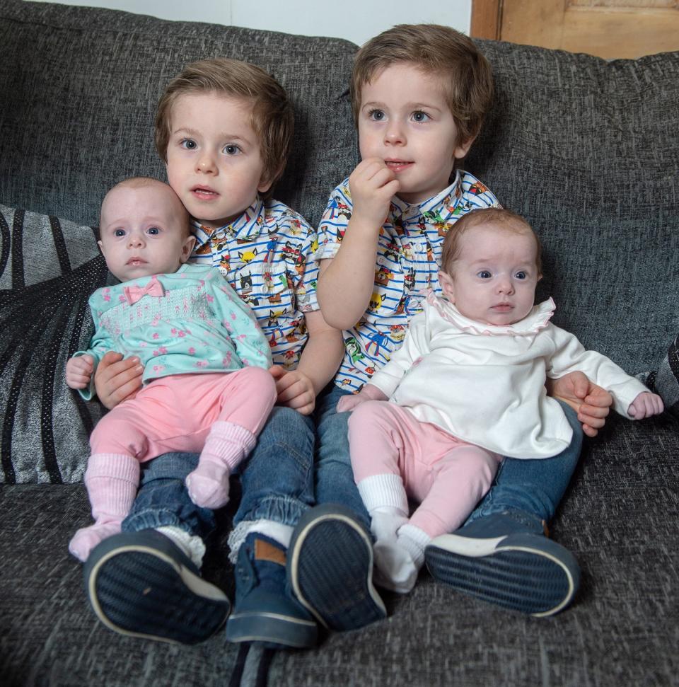 Twins Harry and Elijah with their new sisters twin girls Phoebe and Aria (SWNS)