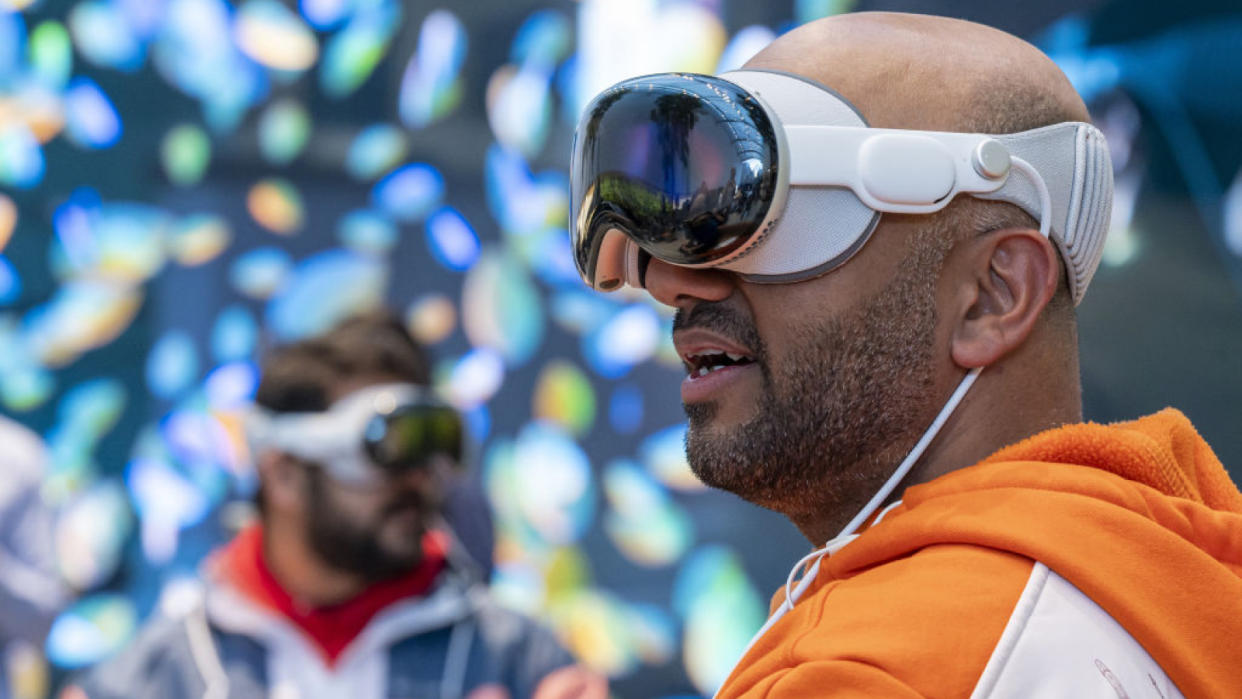  A man with an Apple Vision Pro mixed reality (XR) headset at the company's store in Palo Alto, California, US. 