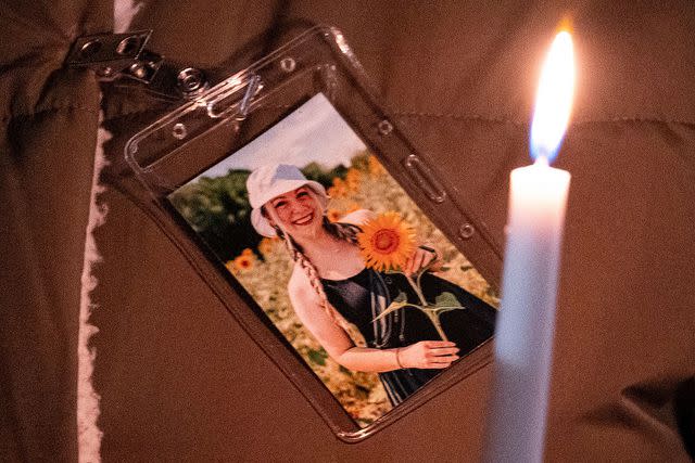 <p>Billy Schuerman/The Virginian-Pilot/Tribune News Service via Getty</p> A photo of Abby Zwerner is pinned to a coat during a vigil for Abby Zwerner, the teacher shot by a 6-year-old student at Richneck Elementary, in front of the Newport News Public Schools Administration Building in January. She made her first public appearance Monday, March 20, 2023.